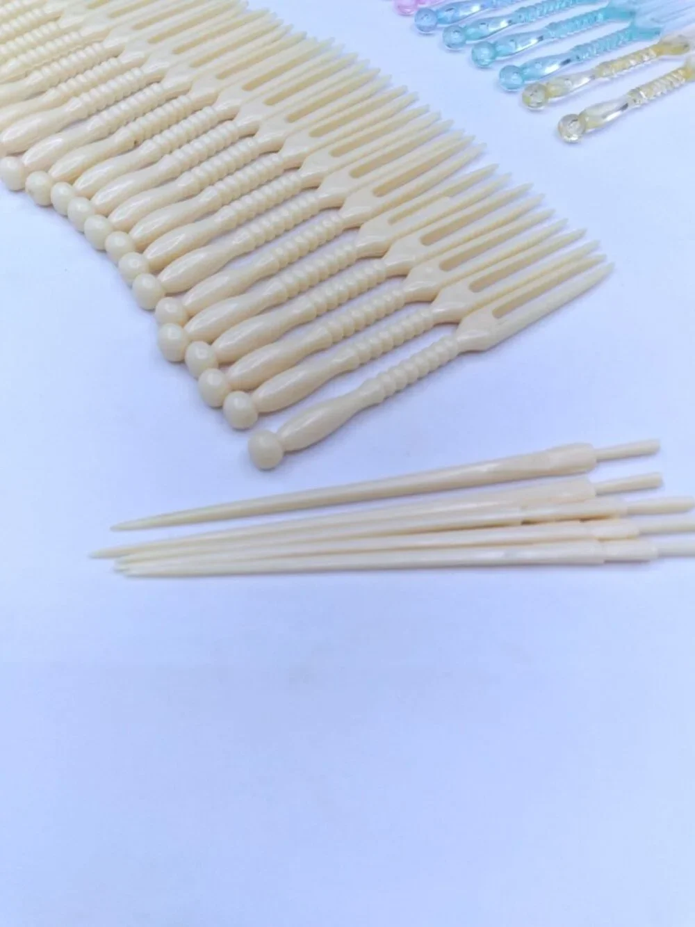 hors d'oeuvre fork tooth picks ivory tone and multicolored plastic vintage